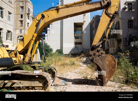 Yellow Excavator Parking In Front Of Bulidings Beirut Lebanon Stock
