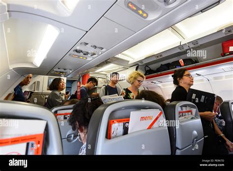 Passengers Boarding A Jetstar Airbus A320 At Sydney Airport New South