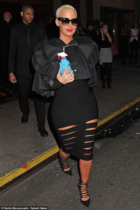 Amber Rose Flaunts Her Curves In Mini Dress As She Leaves Tao Club In