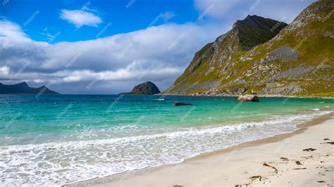 Premium Photo Paradise Beach Amidst The Mighty Norwegian Cliffs