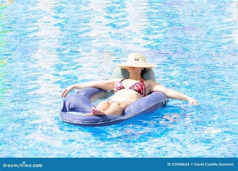 Woman Resting And Tanning In The Pool Stock Images Image 23908654