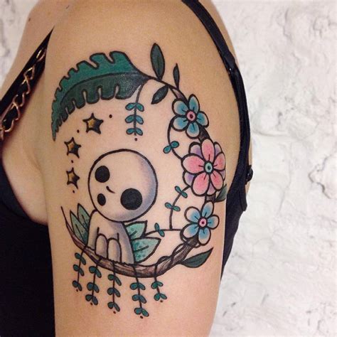 Book a free consultation online at www.tattooabyss.com. Kawaii style kodama tattoo on the left upper arm.