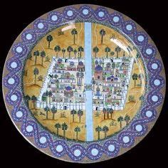 A Decorative Plate With An Image Of A City On The Side And Palm Trees