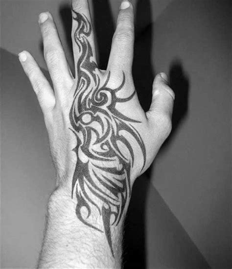 40 Tribal Hand Tattoos For Men Manly Ink Design Ideas