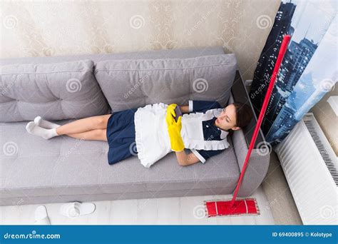 Lazy Work Shy Housekeeper Taking A Break Stock Image Image Of Checking Indolent 69400895