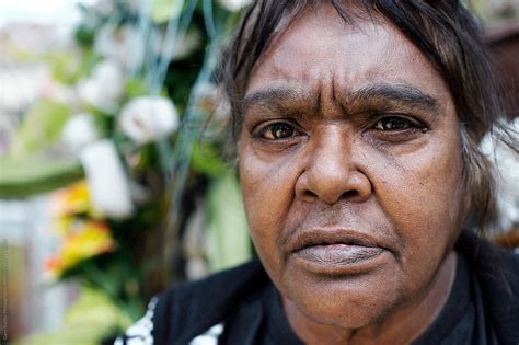Aboriginal Woman With A Serious Expression By Stocksy Contributor