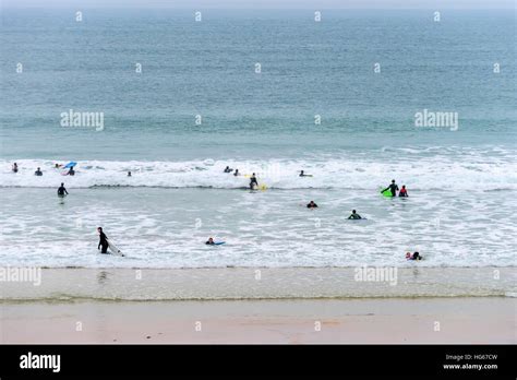 Surfers On Porthmeor Beach At St Ives In Cornwall Stock Photo Alamy