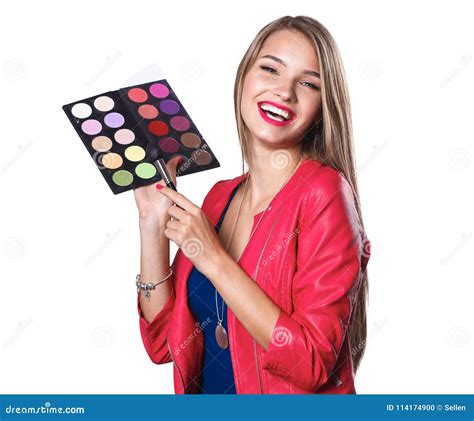 Young Beautiful Woman Holds In One Hand And A Palette With Paint And