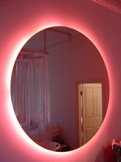 One place where feng shui experts warn against hanging a mirror is behind a sofa or a bed. Pink Neon bathroom mirror this is kool would be nice to ...