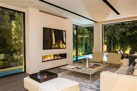 7 Reasons To Stand In Awe Of The Indoor Outdoor See Through Fireplace