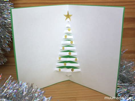 Purchase the template for this design here: How to Make a Pop-Up Christmas Tree Card - Muumade