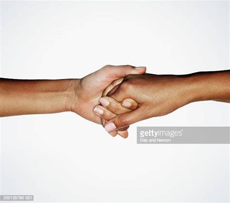 Linking Hands Photos And Premium High Res Pictures Getty Images
