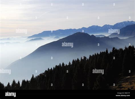 asiago plateau veneto pre alps italy on background the po valley immersed in the smog stock