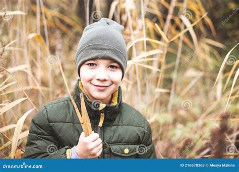 Happy Boy Walks In An Autumn Forest Stock Photo Image Of Landscape