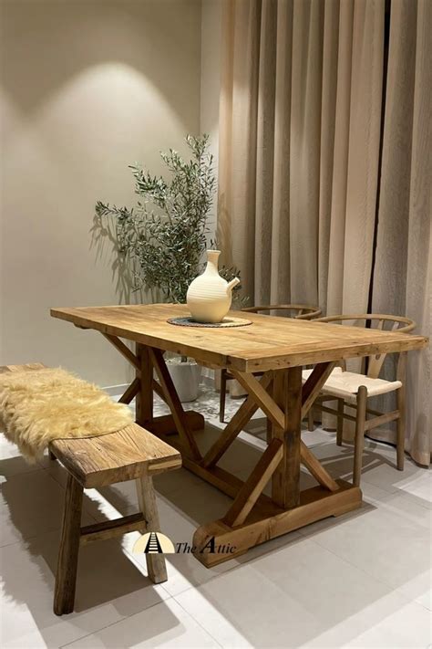 The Tuscany Reclaimed Pine Dining Table Accompanied By Wishbone Chairs