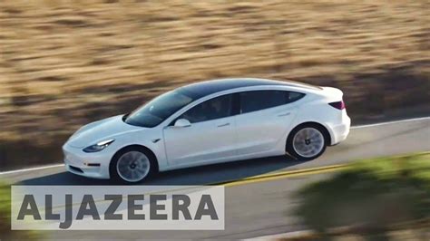Tesla Launches Its First Affordable Electric Car Model 3 Youtube