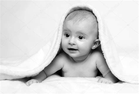 Young Baby Lying On Blanket Stock Photo By ©anetta 79130278