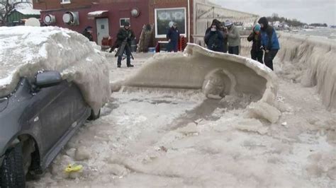 Watch Car Cocooned In Inches Of Ice Frozen To New York Parking Spot