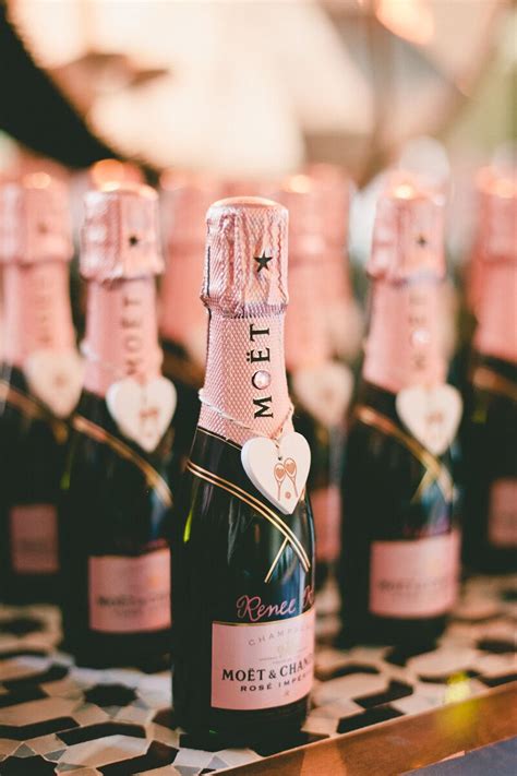 The rose gold wedding trend is nothing new, and nowadays this pretty, pinkish metallic hue can be seen in details at the chicest of weddings, from sparkling tabletop decor. Rose Gold Moet Champagne Escort Cards
