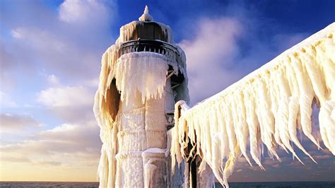 Snow Covered St Joseph Lighthouse Wallpaper Preview