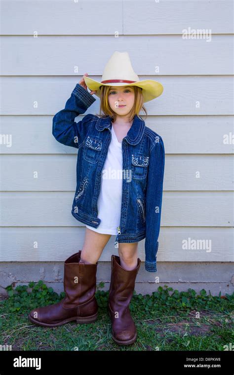 Girl With Cowboy Boots Hi Res Stock Photography And Images Alamy