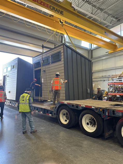 Tiny home village offering rent-free living is unveiled - houses come