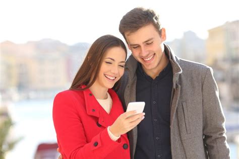 Woman Texting With Man Smiling Body Language Central