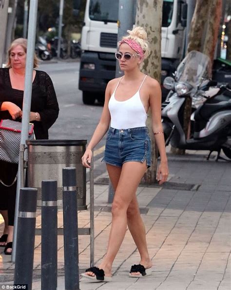 Pixie Lott Goes Braless Under White Vest Top In Barcelona Daily Mail