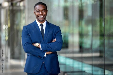 Smiling African American Businessman CEO Standing Proud With Arms Crossed Outside Office