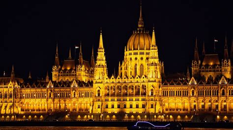 Hungarian Parliament Building By Night Wallpaper Backiee