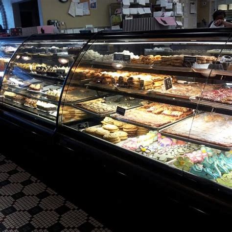 The bakery decorates cakes with frosting patterns, fondant shapes, and frosting flowers in colors that. Edgars Bakery -Financial Center in Birmingham, AL | The ...