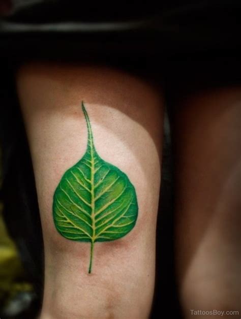 Green Leaf Tattoo On Thigh Tattoo Designs Tattoo Pictures