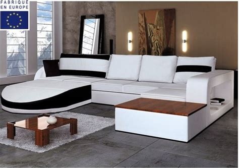 Grâce à son tissu doux et son assise confortable, il est idéal pour des moments conviviaux en famille ou entre amis. Canapé d'angle design simili blanc et noir angle gauche ...