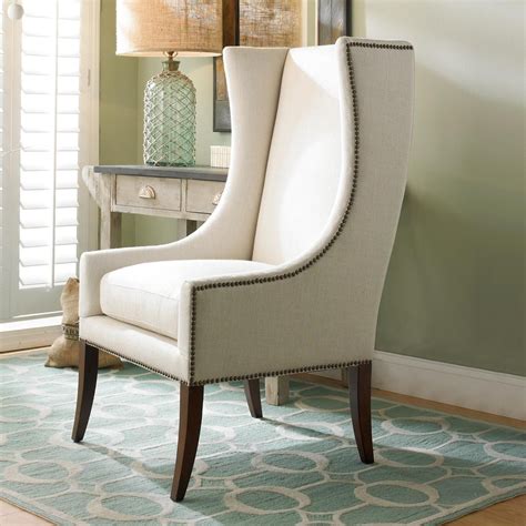 Create a space that welcomes you and your guest and makes each. Modern Wing Chair w/ Nailhead TrimThis sleek accent chair ...