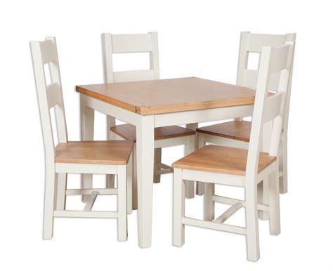 Looking to spruce up your dining area? Oakwood Living Ivory Painted Oak Dining Table 90cm - Lodge ...
