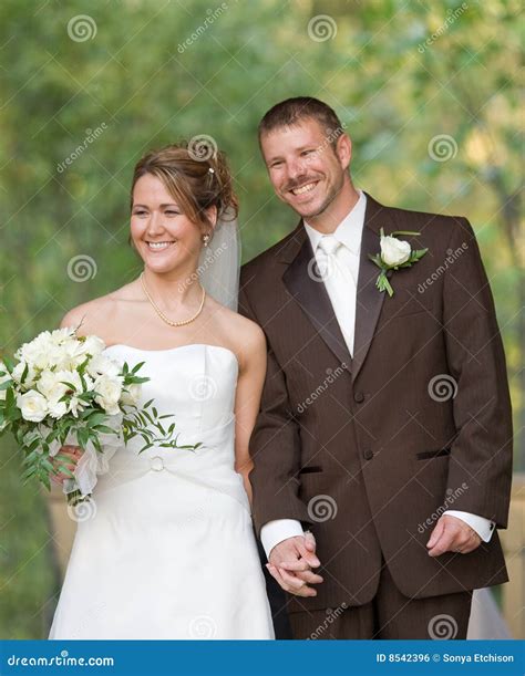 Bride And Groom Holding Hands Stock Photo Image Of Dressed Dress
