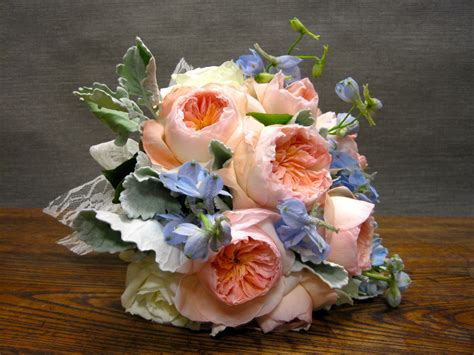 Buy flowers, plants, decoration and related items online. Peach and white garden roses, light blue delphinium, and ...