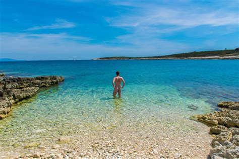 Beach Croatia People Cliff Jumping In Dubrovnik Croatia Joel Carillet The Beach Is