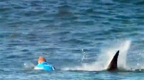 3 Time World Champ Fanning Escapes Shark Attack During Surfing