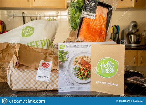 Hello Fresh Meal Kits Packed In Paper Bags With Recipe Card To Prepare