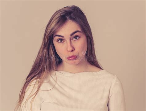Funny Sad Face Portrait Of Young Teenager Woman Making Cute Sad Facial