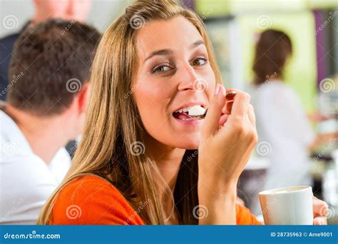 Young Woman Eating Cream In Cafe Stock Image Image Of Caucasian