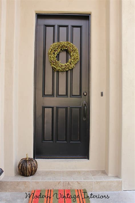 Painting a steel door is similar to painting a car. * Remodelaholic *: Painting A Wooden Exterior Door Black