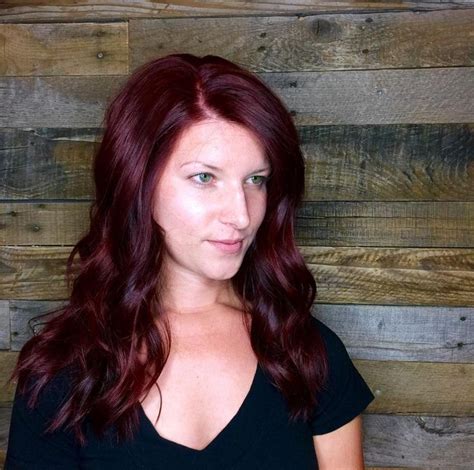 the ultimate fall hair color rich dramatic dark red of course this shiny auburn red by