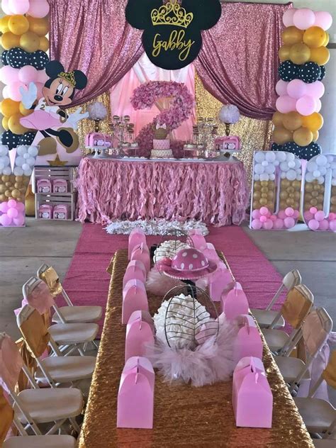 the dessert table and table settings at this minnie mouse princess birthday party are amazing