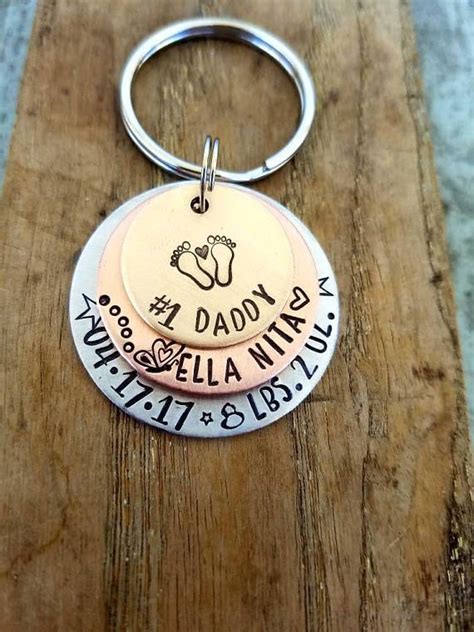 This father's day, don't forget about the other dad in your life — your grandpa. Personalized hand stamped new baby keychain. First fathers ...