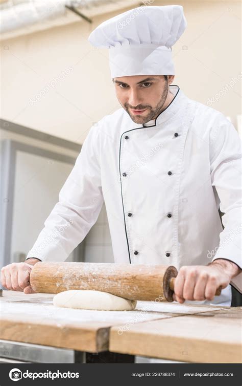 Chef Rolling Out Dough Rolling Pin Wooden Table — Stock Photo