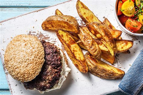 Burgers Potato Wedges And Tomato Salad Recipe Hellofresh Recipe