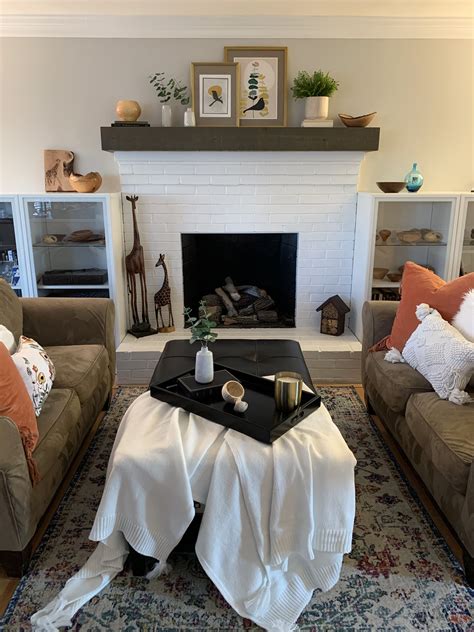 Should i still be trying to take the top two rows out or yeah, that's what i was thinking; Mid century mix white brick fireplace styling in 2020 ...