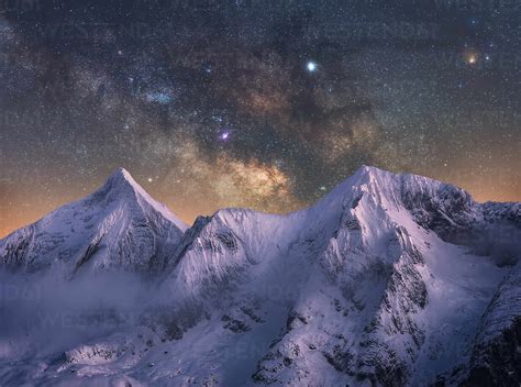 Amazing View Of White Snowy Mountain Range Under Incredible Night